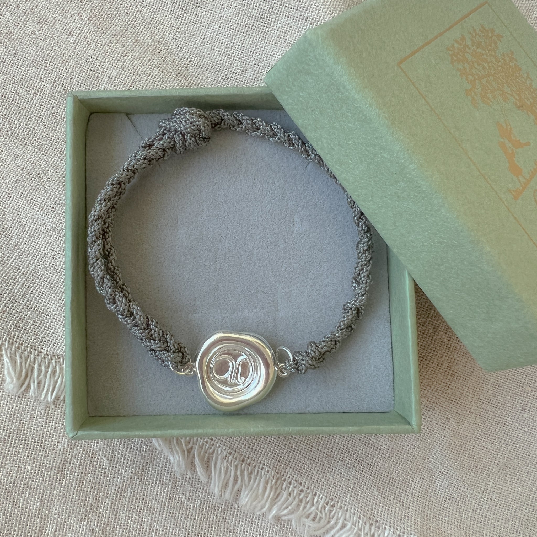 Braided Bracelet Grey with 925 Silver Monogram Wax Seal | Adjustable Bracelet | Alphabet Charm | Personalised | Engraving