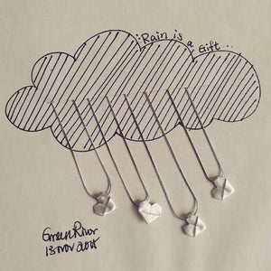 我愛下雨天！ 由我的摺紙心項鍊啟發的插圖。