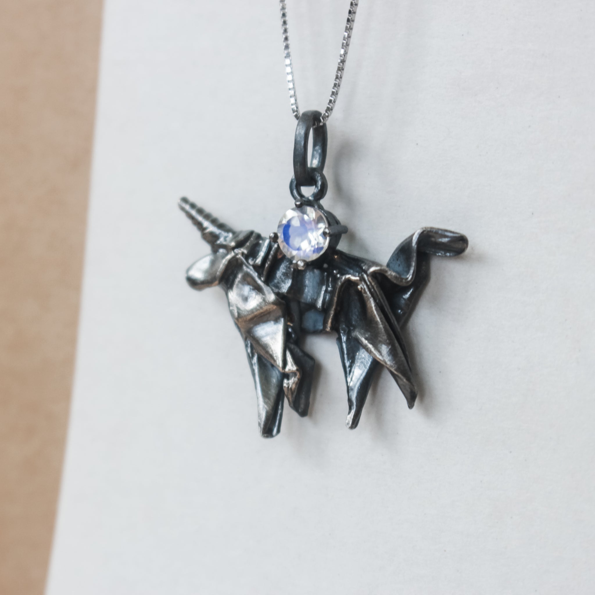 Black Silver Origami Unicorn Merry-go-round Necklace with Moonstone