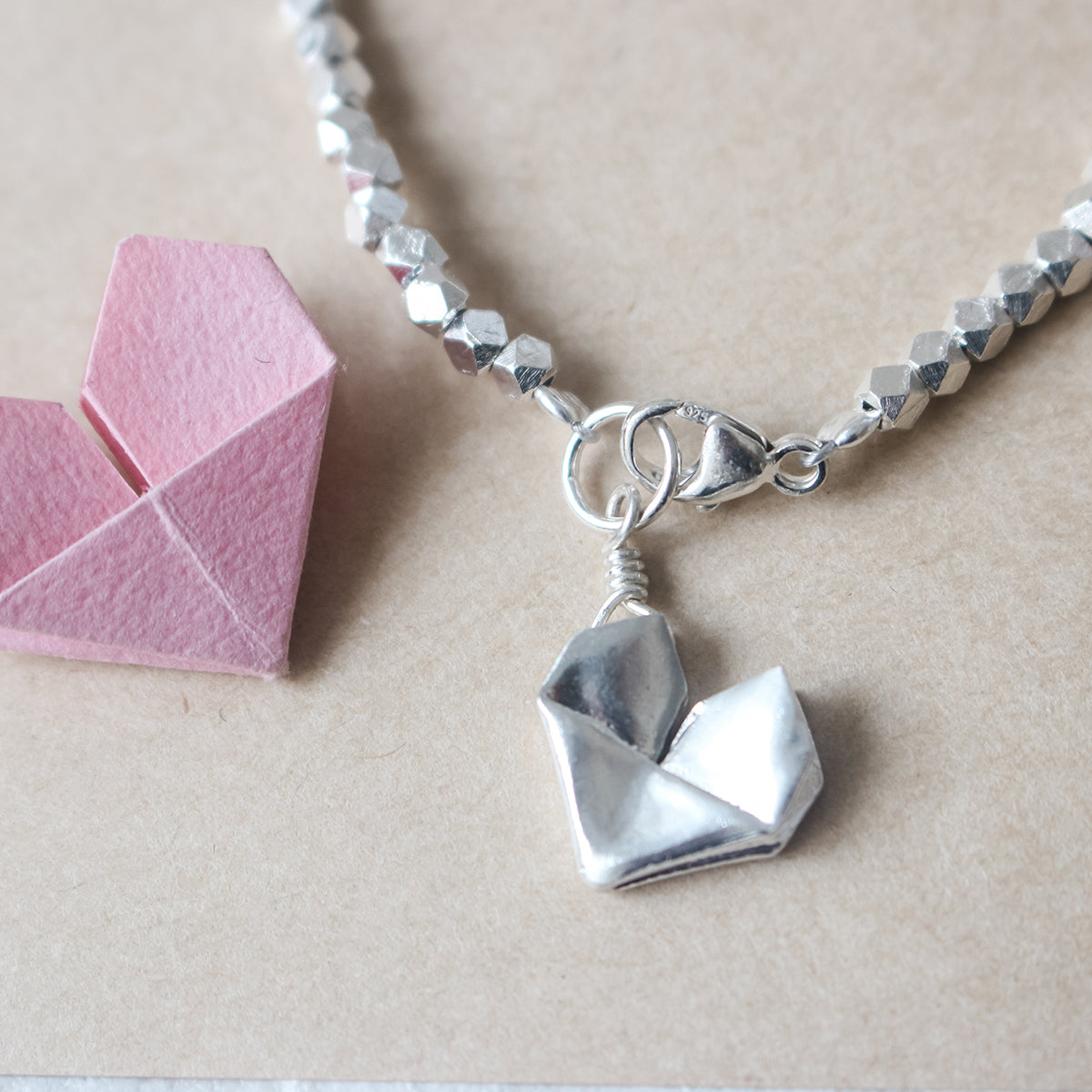 Origami Heart Shaped DIY Bracelet for Valentine's Day | Origami heart, Easy  paper crafts, Diy bracelets